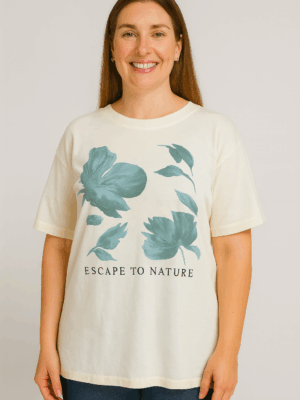 Camiseta Feminina Estampada “Escape to Nature” – Leveza e Inspiração para o Dia a Dia